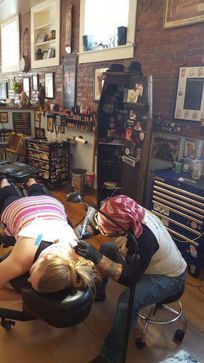 Tattoo Shop «The Shop», reviews and photos, 141 S Grand Ave, Fowlerville, MI 48836, USA