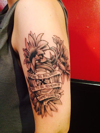 Explore minimalist dog tattoo ideas, creative tattoo ideas in Powell, available at Against All Odds Tattoos and Piercings