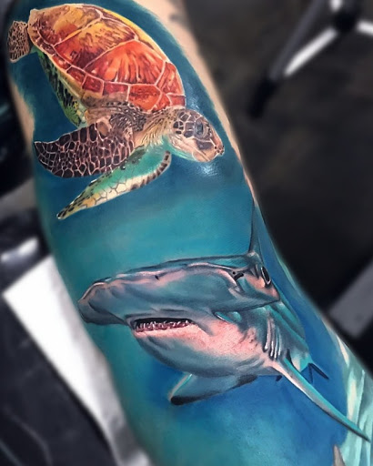 Explore arm tattoo cover up ideas, creative tattoo ideas in Miami, available at INKAHOLIK TATTOOS