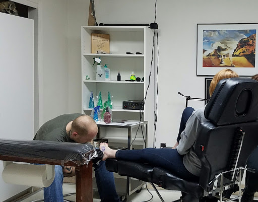 Explore small mens tattoo ideas, creative tattoo ideas in Evansville, available at Baldwins Body Art