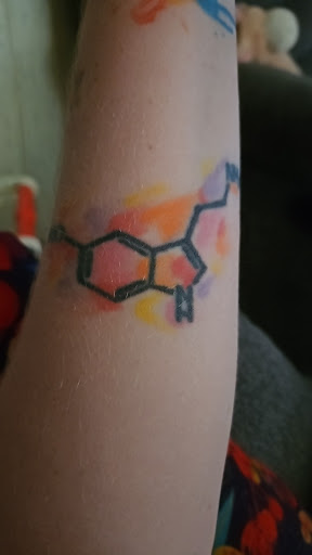 Explore matching tattoo ideas for brothers, creative tattoo ideas in Toledo, available at 4 Nineteen Ink