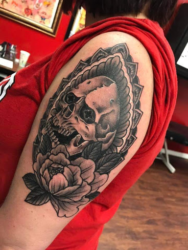 Explore neck sleeve tattoo ideas, creative tattoo ideas in Powell, available at Against All Odds Tattoos and Piercings