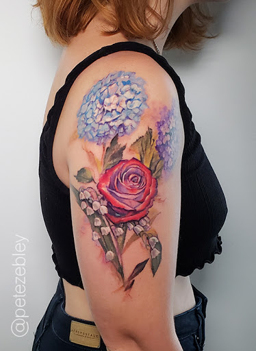Explore ribbon tattoo ideas, creative tattoo ideas in Philadelphia, available at Central Tattoo Studio