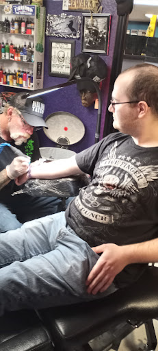 Explore fullback tattoo ideas, creative tattoo ideas in Prudenville, available at Dark Horse Tattoo Studio