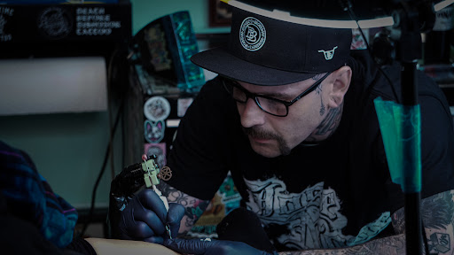 Explore bite me tattoo ideas, creative tattoo ideas in San Leandro, available at Pastime Tattoo