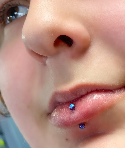 Explore chanel tattoo ideas, creative tattoo ideas in Springfield, available at Body Piercing By Qui Qui