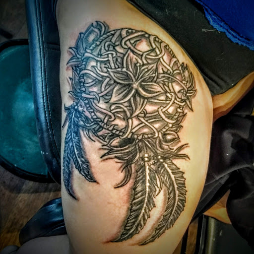 Explore dolly parton tattoo ideas, creative tattoo ideas in Bridgeport, available at Pike Street Studios Tattoo and Body Piercing