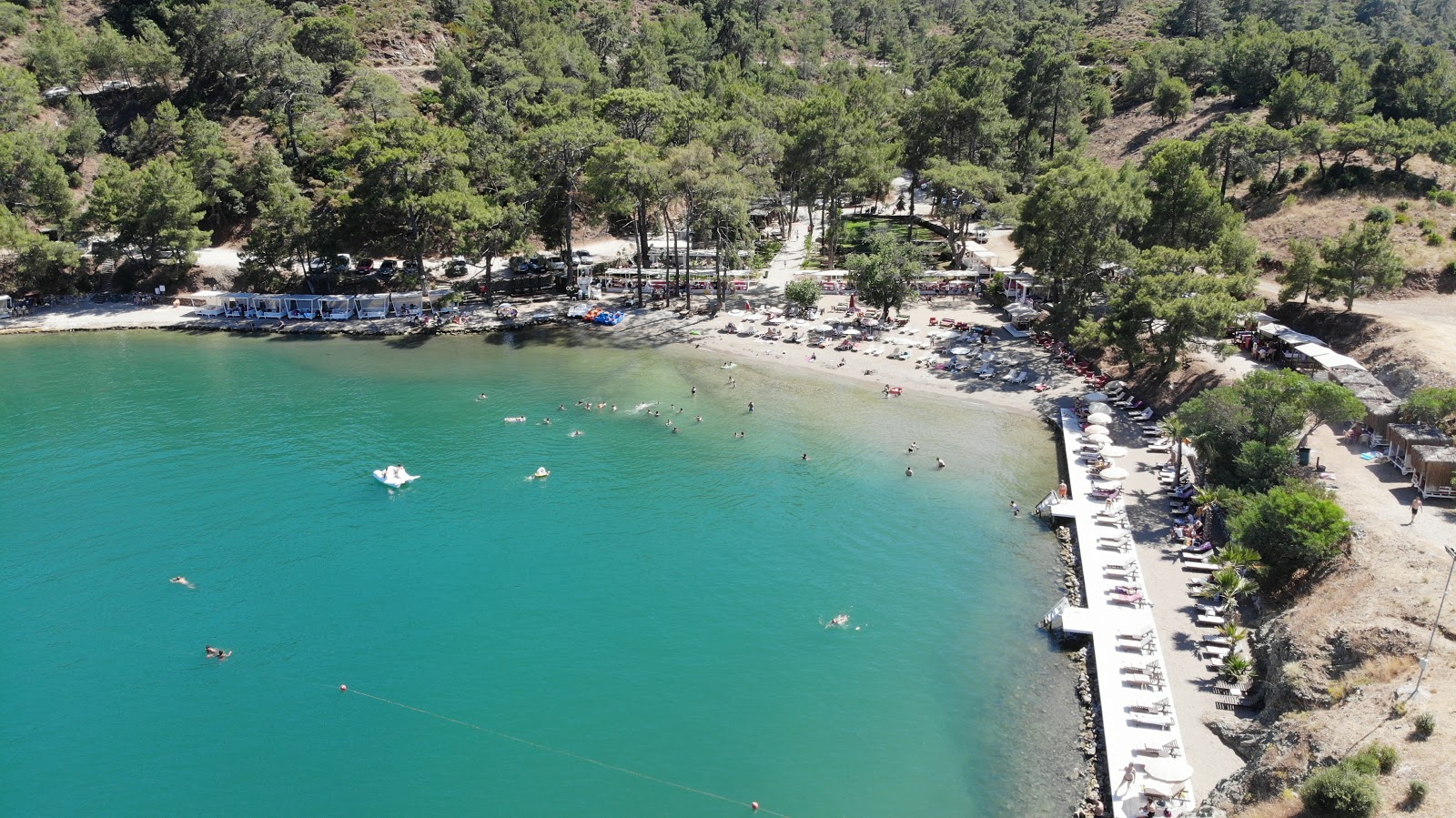 Fotografija Little Samanlik beach z kevyt hiekka ja kivi površino