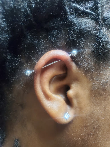 Explore breastfeeding tattoo ideas, creative tattoo ideas in Germantown, available at Ambrotos Tattoo