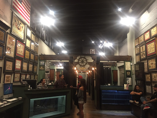 Explore skull and roses tattoo ideas, creative tattoo ideas in Oceanside, available at The Arcade Oceanside Tattoo