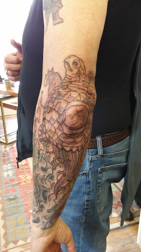 Explore gargoyle tattoo ideas, creative tattoo ideas in North Conway, available at Ampersand Tattoo