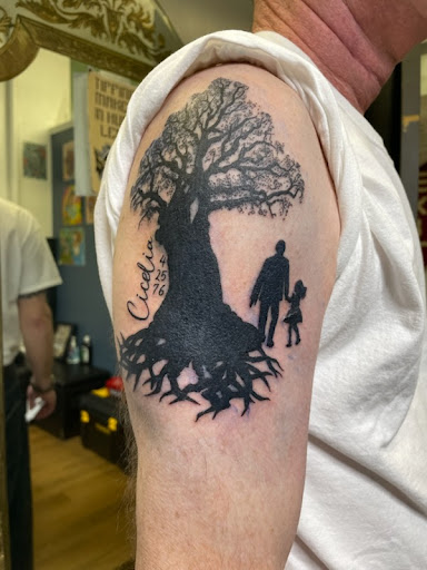 Explore time flies tattoo ideas, creative tattoo ideas in Lansing, available at Ink & Needle West