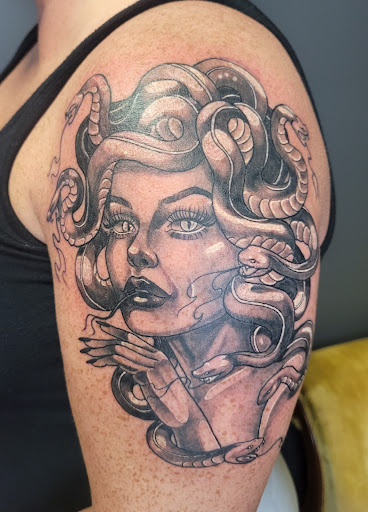 Explore pisces fish tattoo ideas, creative tattoo ideas in Anniston, available at Lucid Dreams Tattoos and Piercings