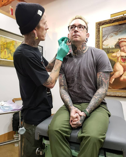 Find dog tattoo idea for your next unique tattoo in Phoenix at Wholehearted Body Piercing