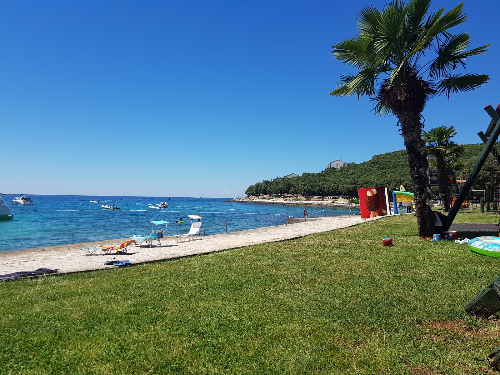 Fotografie cu Porto Sole beach zonele de facilități