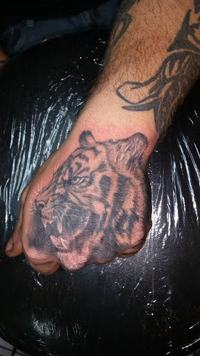 Find cool armband tattoo ideas for your next unique tattoo in Foley at Black Sheep Custom Tattoos and Piercings