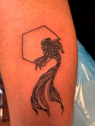 Explore back of leg tattoo ideas, creative tattoo ideas in Seymour, available at American Gypsy Tattoo Corp.