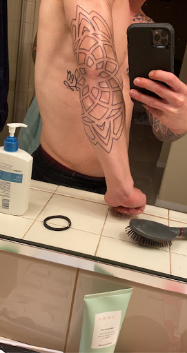 Explore wrist tattoo ideas male, creative tattoo ideas in San Diego, available at Sideshow Tattoo and Piercing