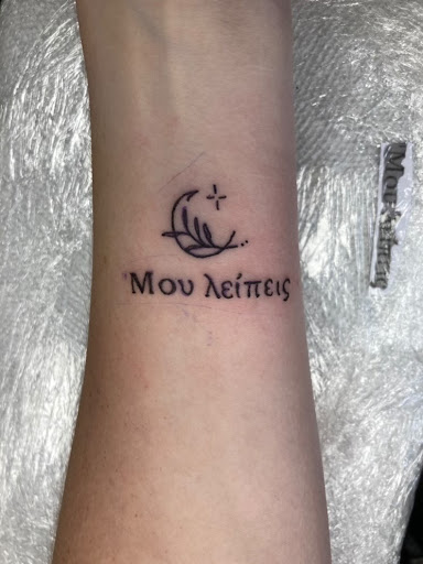 Explore women's hand tattoo ideas, creative tattoo ideas in Slippery Rock, available at Dinky Dachshund Tattoo Parlor