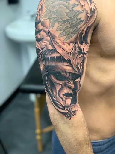 Explore arm sleeve tattoo ideas for females, creative tattoo ideas in Tallmadge, available at Killjoy tattoo