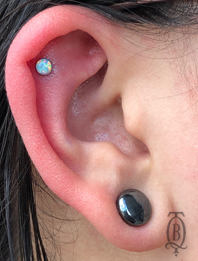 Explore broken heart tattoo ideas for guys, creative tattoo ideas in Marietta, available at The Queen Bee Tattoo and Piercing Parlour