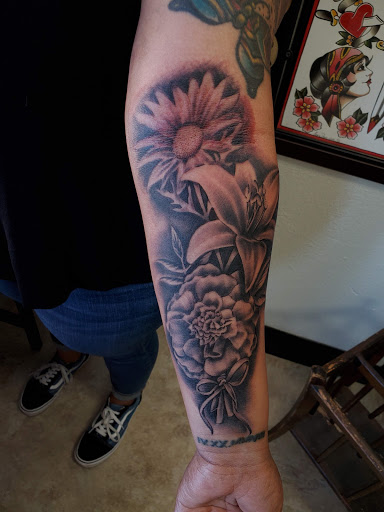 Explore rose tattoo ideas for females, creative tattoo ideas in Bakersfield, available at CLASSIC STANDARD TATTOO CO.