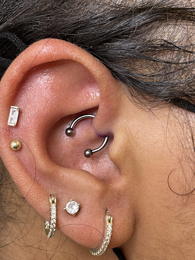 Explore spine tattoo ideas for men, creative tattoo ideas in Norwalk, available at Tribu Norwalk