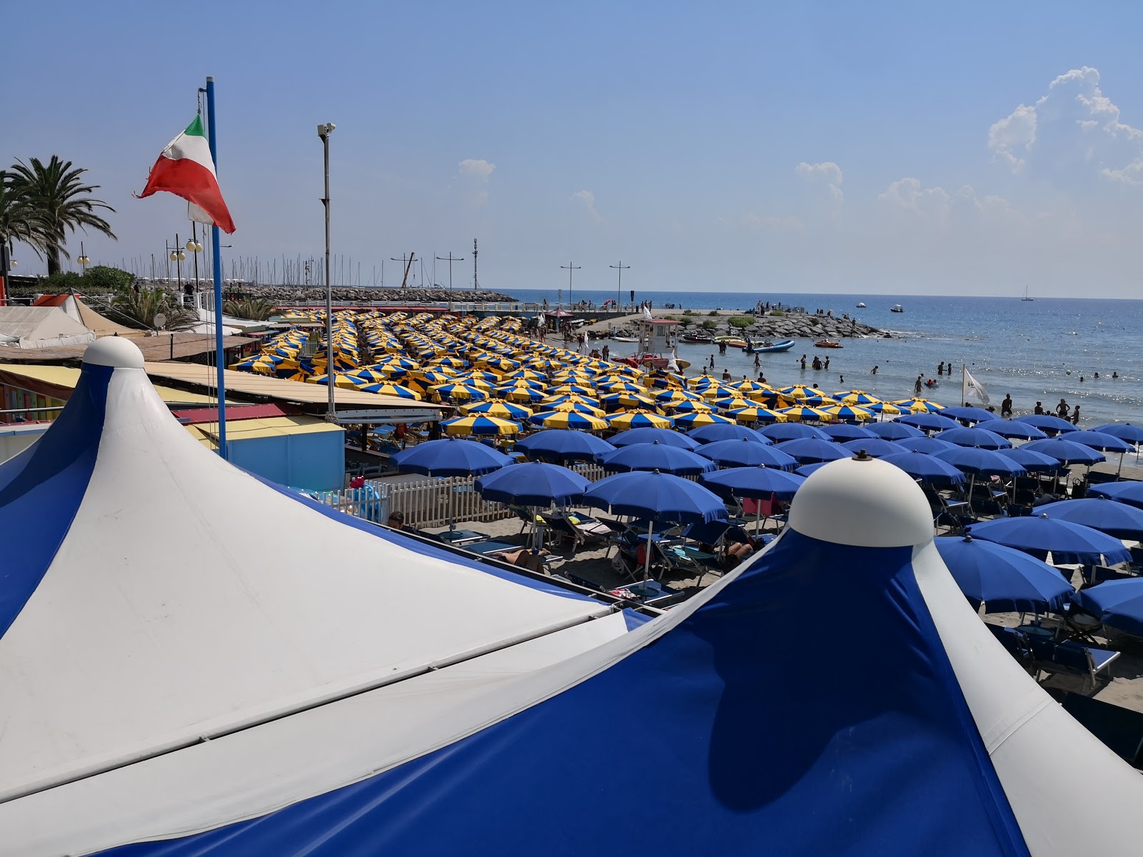 Photo of Andora beach II with blue water surface