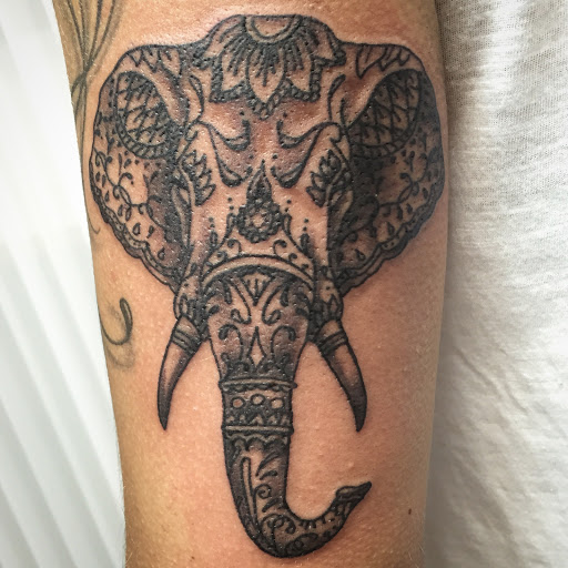 Explore dog collar tattoo ideas, creative tattoo ideas in Clarksburg, available at Art & Soul Studio Of Tattoo