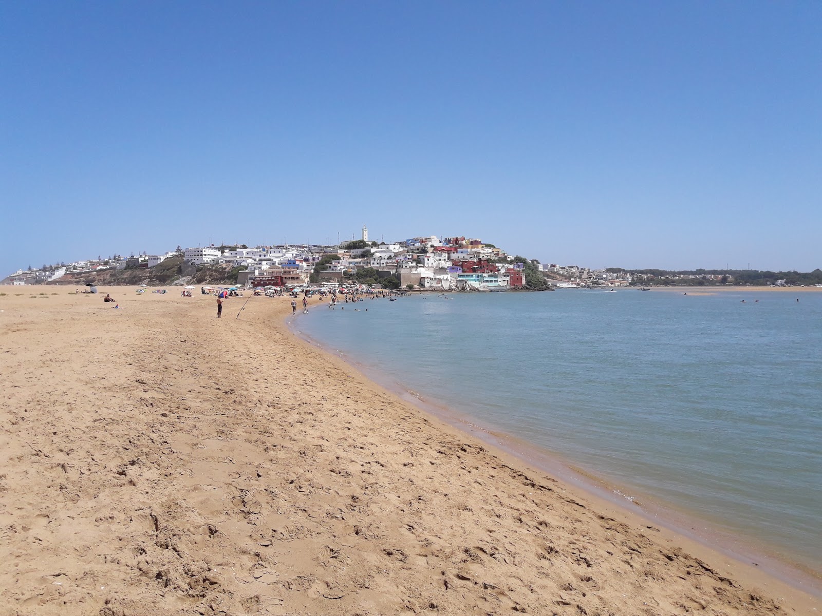 Foto af Moulay Bousselham beach med lys fint sand overflade