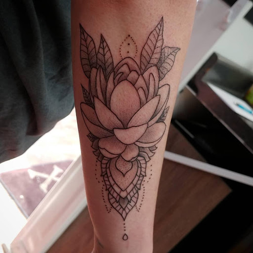 Explore men tattoo ideas leg, creative tattoo ideas in Mchenry, available at Lunchbox Tattoo and Body Piercing