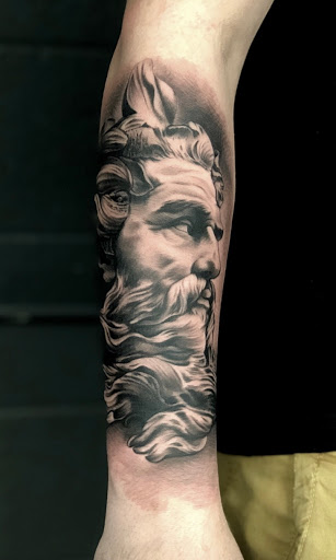 Explore tattoo ideas to cover up a name, creative tattoo ideas in Ottawa, available at Forever Inked Tattoo Company
