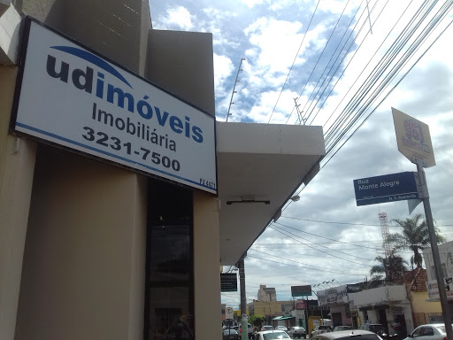 Logo da empresa - Udimóveis Imobiliária