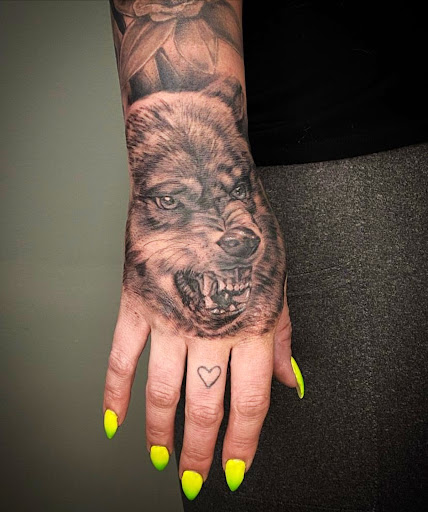 Explore playing cards tattoo ideas, creative tattoo ideas in Amherst, available at Wanderlust Tattoo & Piercing