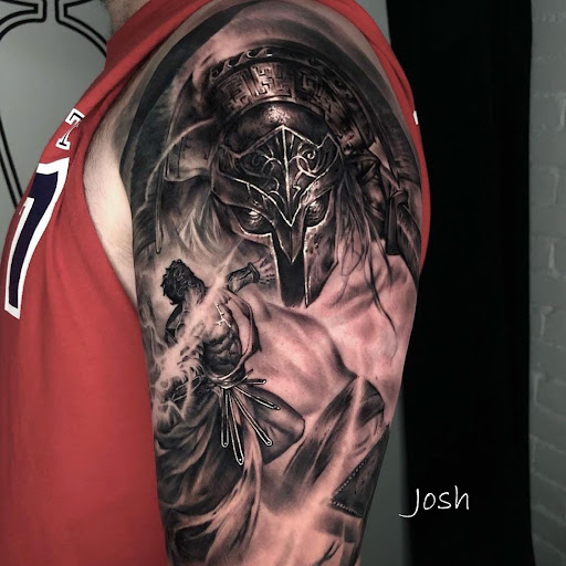 Explore cover up tattoo ideas for upper arm, creative tattoo ideas in Sanford, available at Venom Ink Tattoo