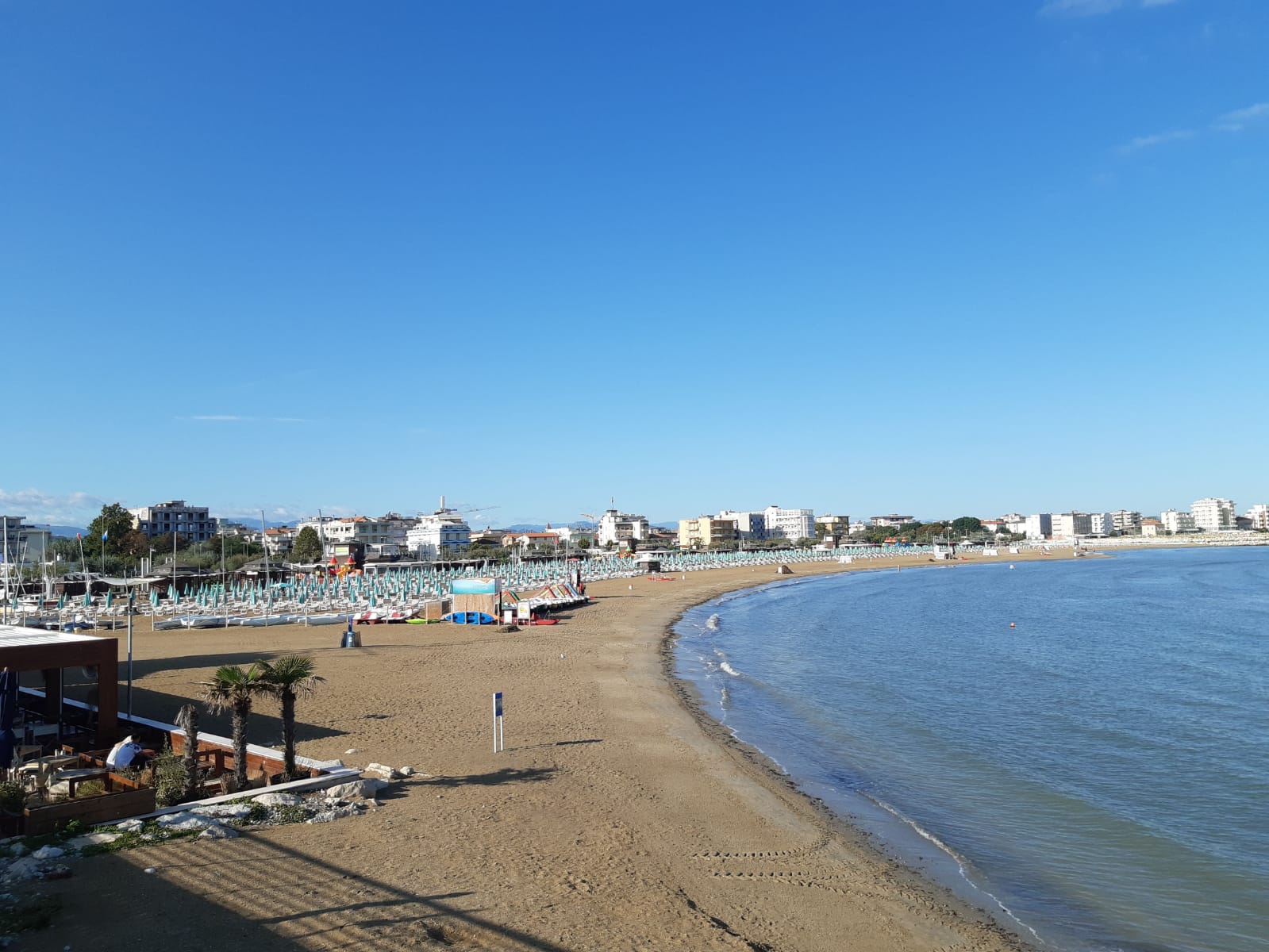 Fotografija Spiaggia Briolini z svetel fin pesek površino