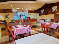 Atmosphère du Restaurant de spécialités alsaciennes Brasserie-Hotel-Restaurant le Scharrach à Scharrachbergheim-Irmstett - n°12