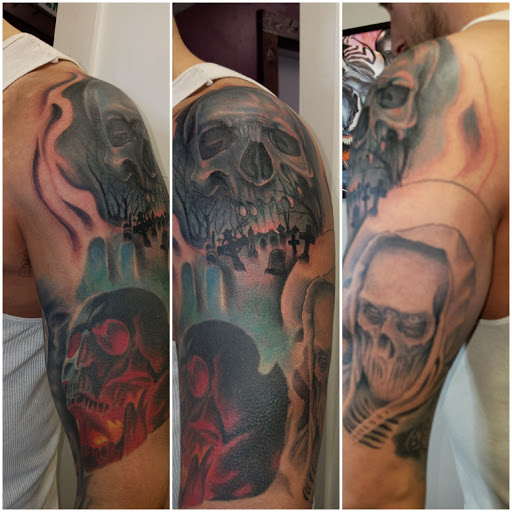 Explore thigh tattoo ideas for women, creative tattoo ideas in Angola, available at Hoodlum Ink