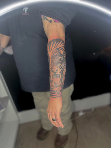 Explore venom tattoo ideas, creative tattoo ideas in Spirit Lake, available at Castaway tattoo