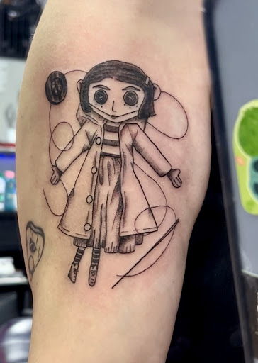 Explore charm tattoo ideas, creative tattoo ideas in Englewood, available at 7 Souls Tattoo and Body Piercing Studio