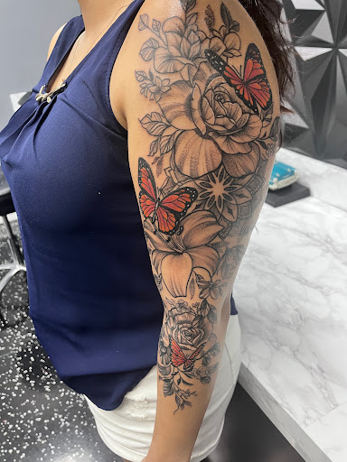 Explore eagle and flag tattoo ideas, creative tattoo ideas in Fort Myers, available at Loyal 2 The Coil Tattoos & Piercings (Edison Mall Location Entrance F)