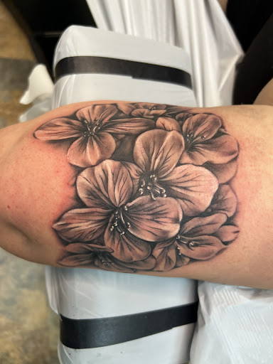Explore music tattoo sleeve ideas, creative tattoo ideas in Adrian, available at Good Life Tattoo Co.