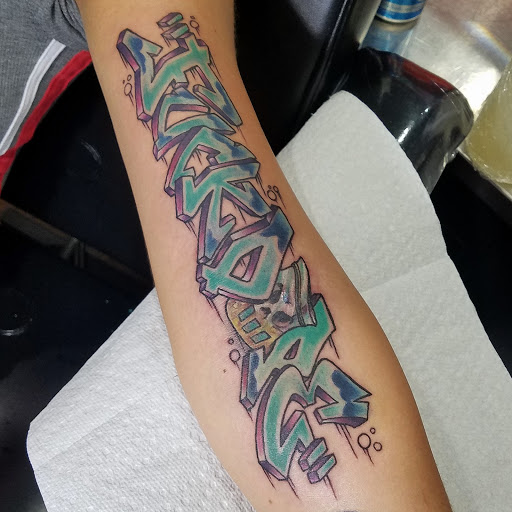 Explore tattoo ideas with writing, creative tattoo ideas in Atlanta, available at Long Island Ink