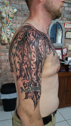 Explore arm tribal tattoo cover up ideas, creative tattoo ideas in Greencastle, available at Castle City Tattoo, LLC