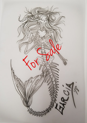 Explore beauty tattoo ideas, creative tattoo ideas in Kearney, available at Ink Shop Tattoos & Piercings