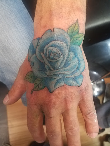 Explore elbow tattoo ideas for guys, creative tattoo ideas in Yorktown, available at Army Navy Tattoo