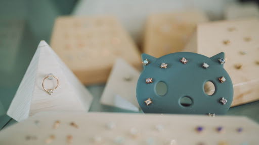 Find tattoo ideas black for your next unique tattoo in Toledo at Piercings by Caitlin presents Holier Toledo