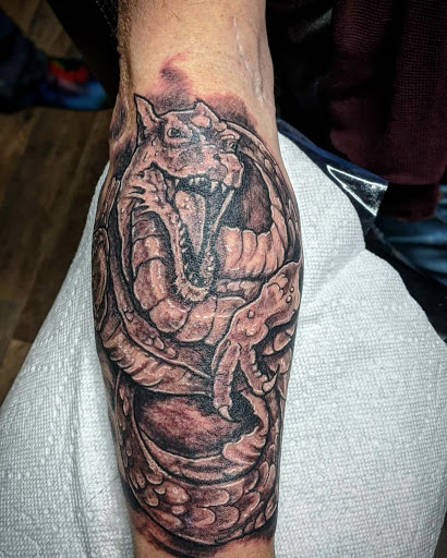 Explore small men's tattoos ideas, creative tattoo ideas in Spencer, available at Ink Envy Tattoo Collective