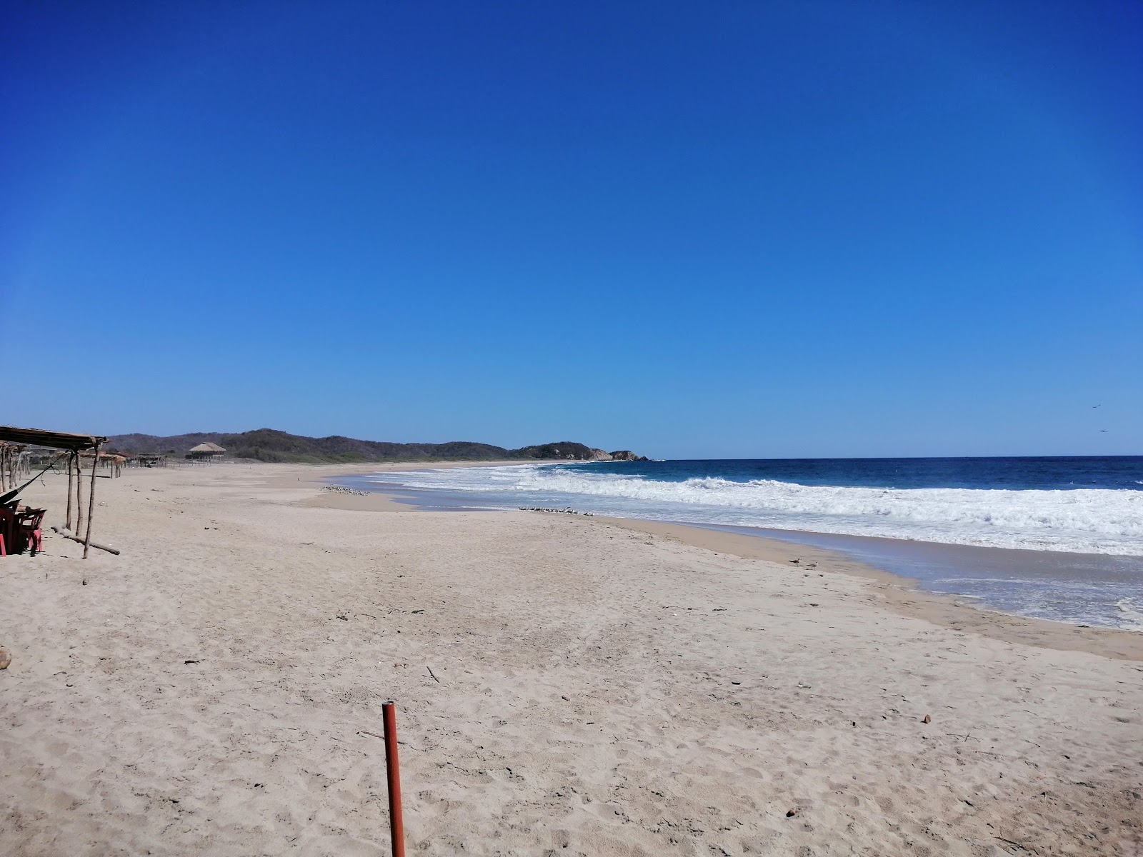 Foto av Coyula beach med turkos rent vatten yta