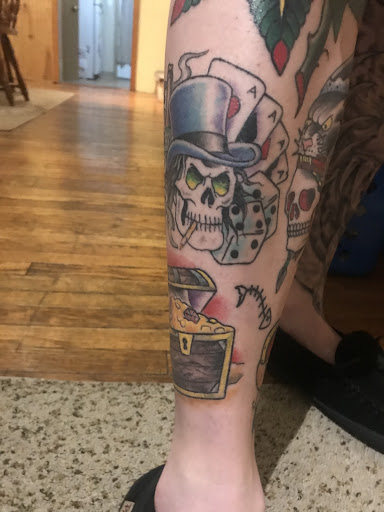 Explore middle finger tattoo ideas, creative tattoo ideas in Altoona, available at Living Canvas Studio LLC